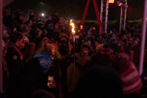 Athlete of the year, Amanda Demmerle, 18, figure skater from Camillus receives the torch at the Opening Ceremony for the Empire State Winter Games in Lake Placid, NY on Thursday, February 3, 2022. (Photo by Hailey Trejo)
